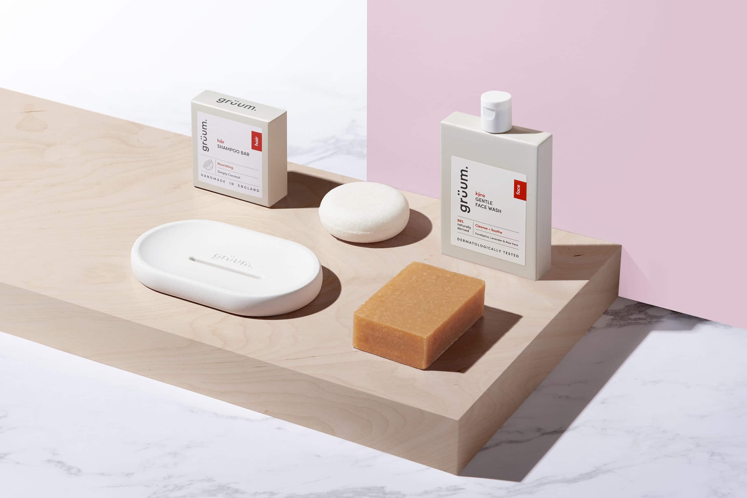 Gruum gift set product image with shampoo bar, kyra face wash, body bar and white halla soap dish