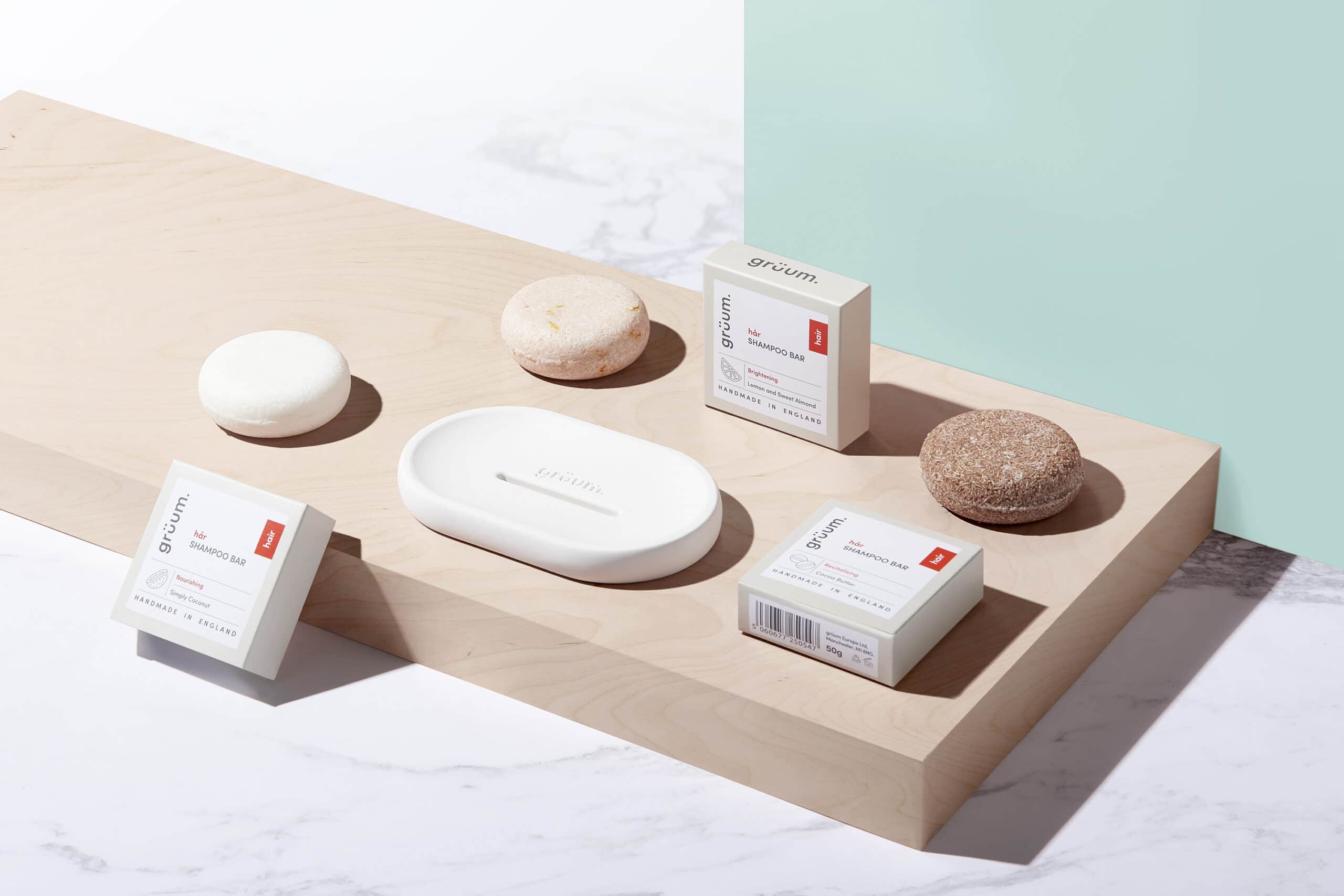 Gruum Shampoo Bar Trio product image with the nourishing, revitalising and brightening shampoo bars and white halla soap dish with Zero plastic